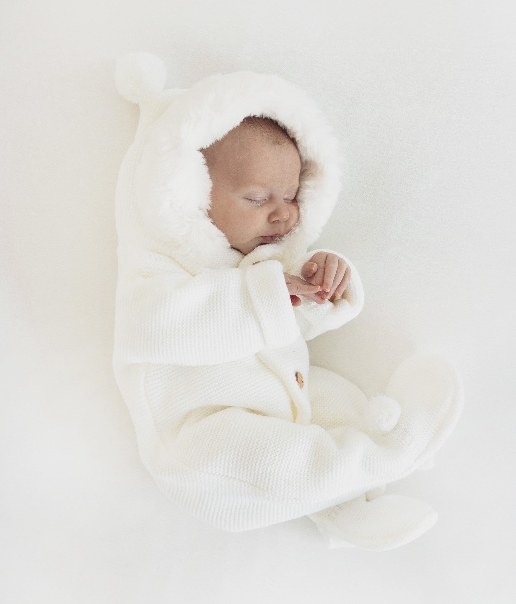 newborn milk classic pramsuit knitted